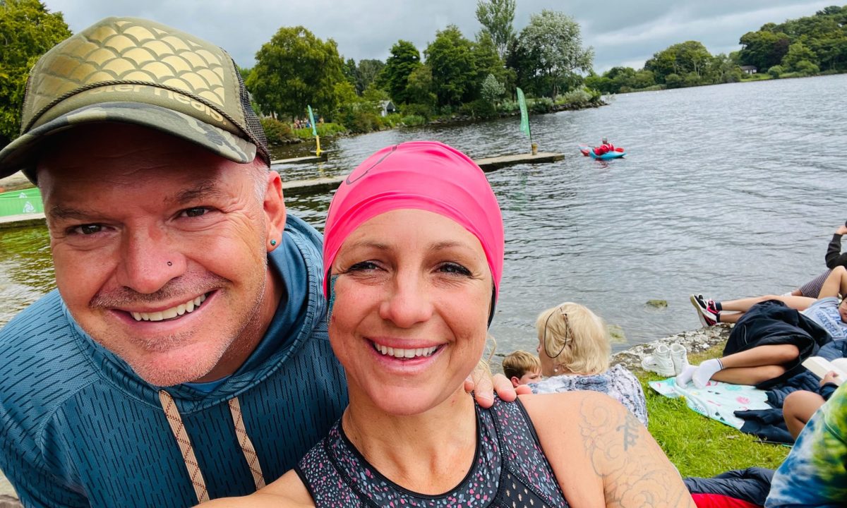 Figs and Teale taking a selfie by the water after Teale's race.